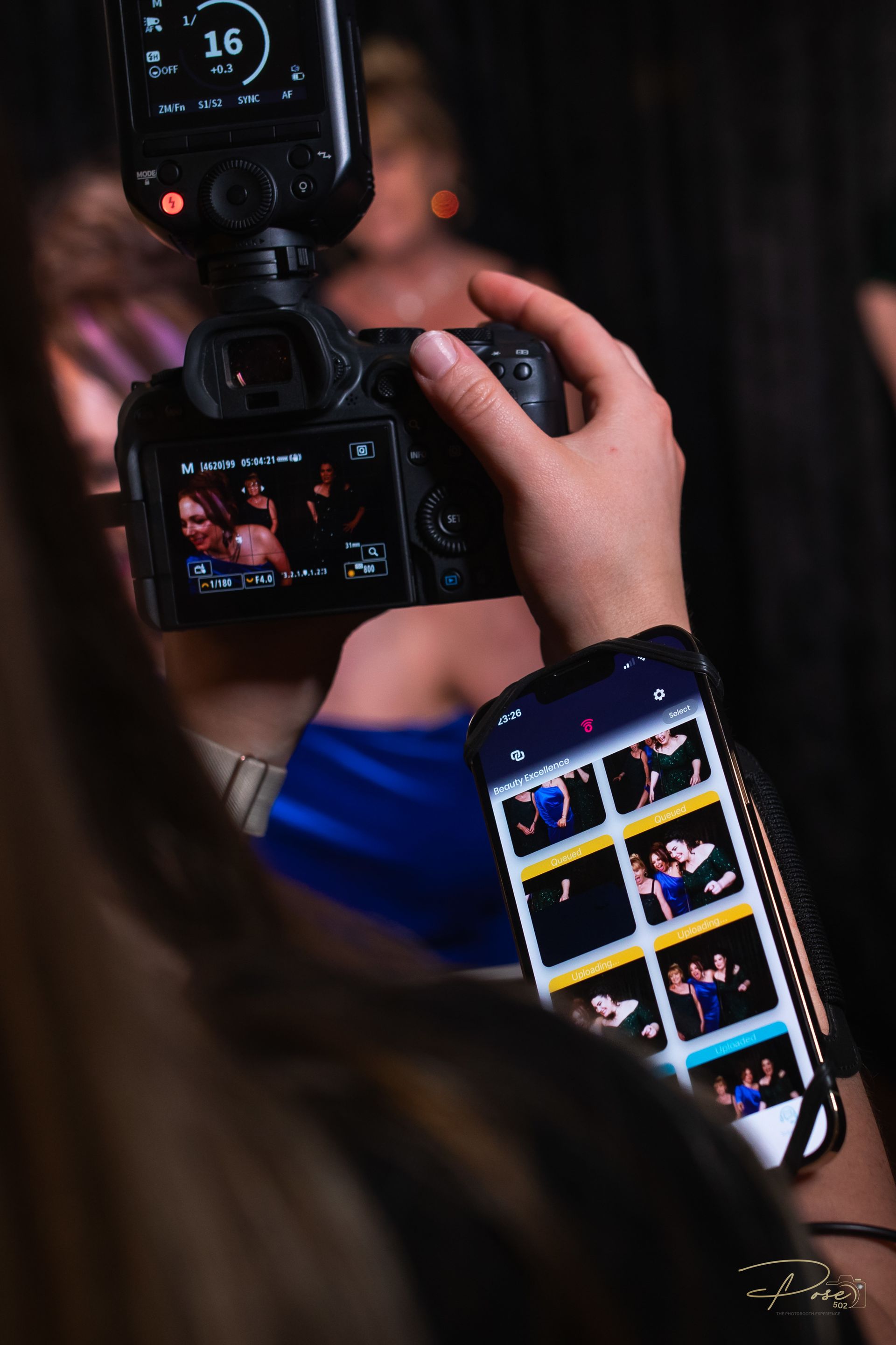 Image of camera and cellphone capturing photos 