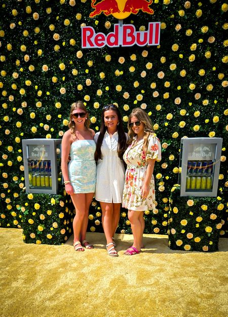 portrait photo booth ladies posing yellow flowers