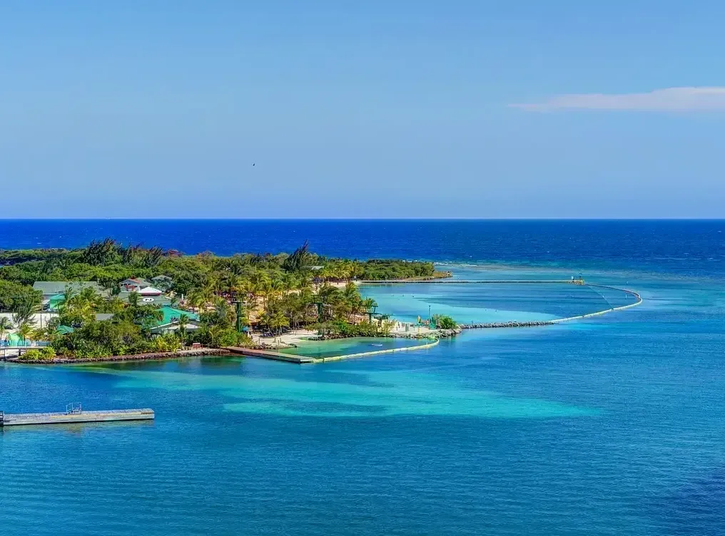 An aerial view of a small island in the middle of the ocean.