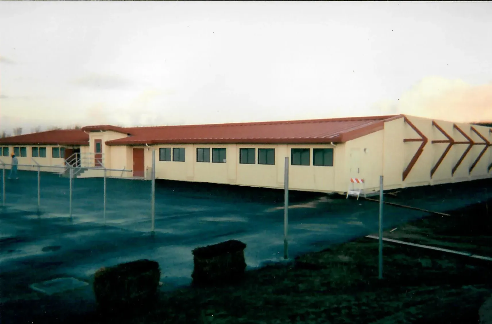 a building with arrows painted on the side of it