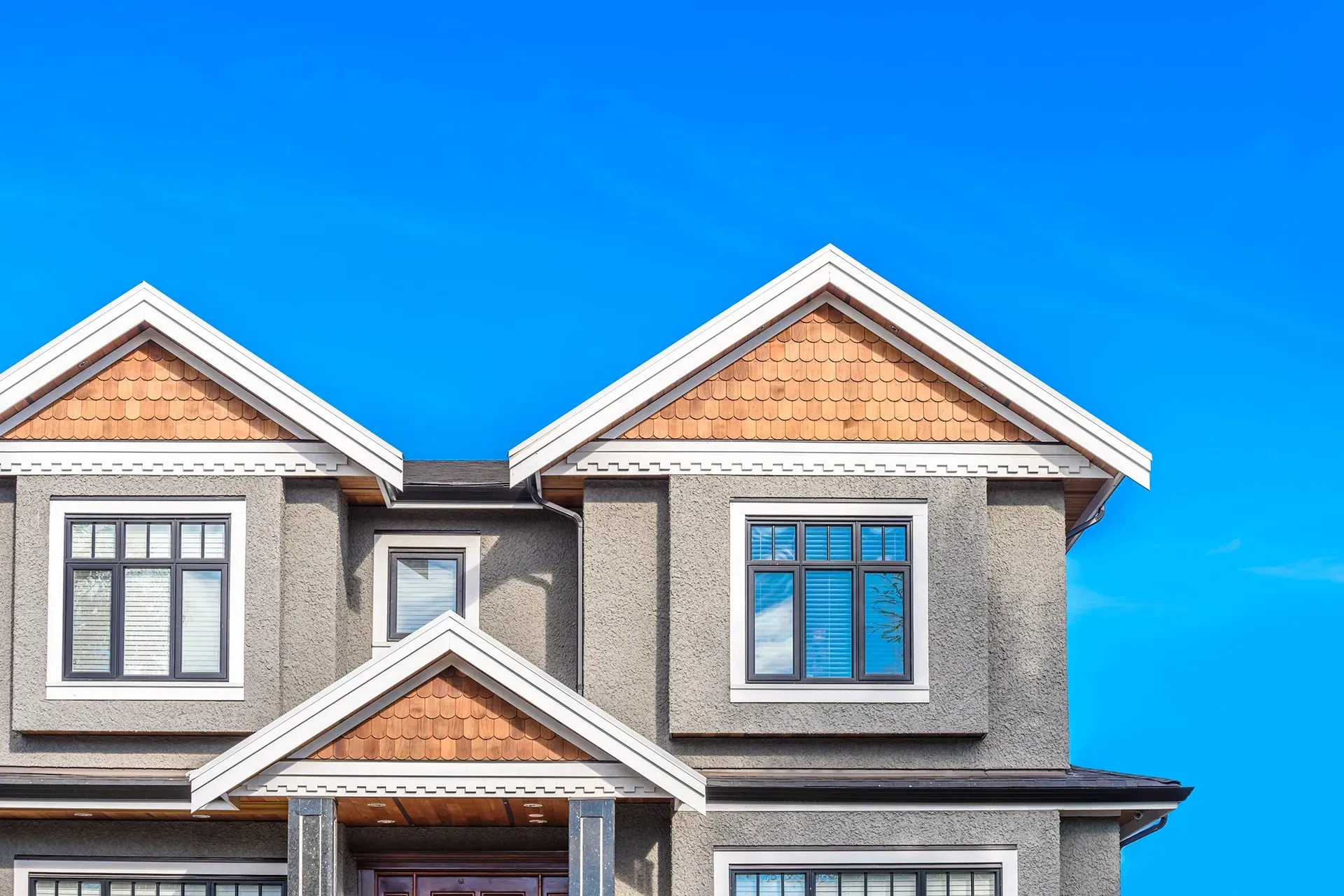 a large house with a blue sky in the background .