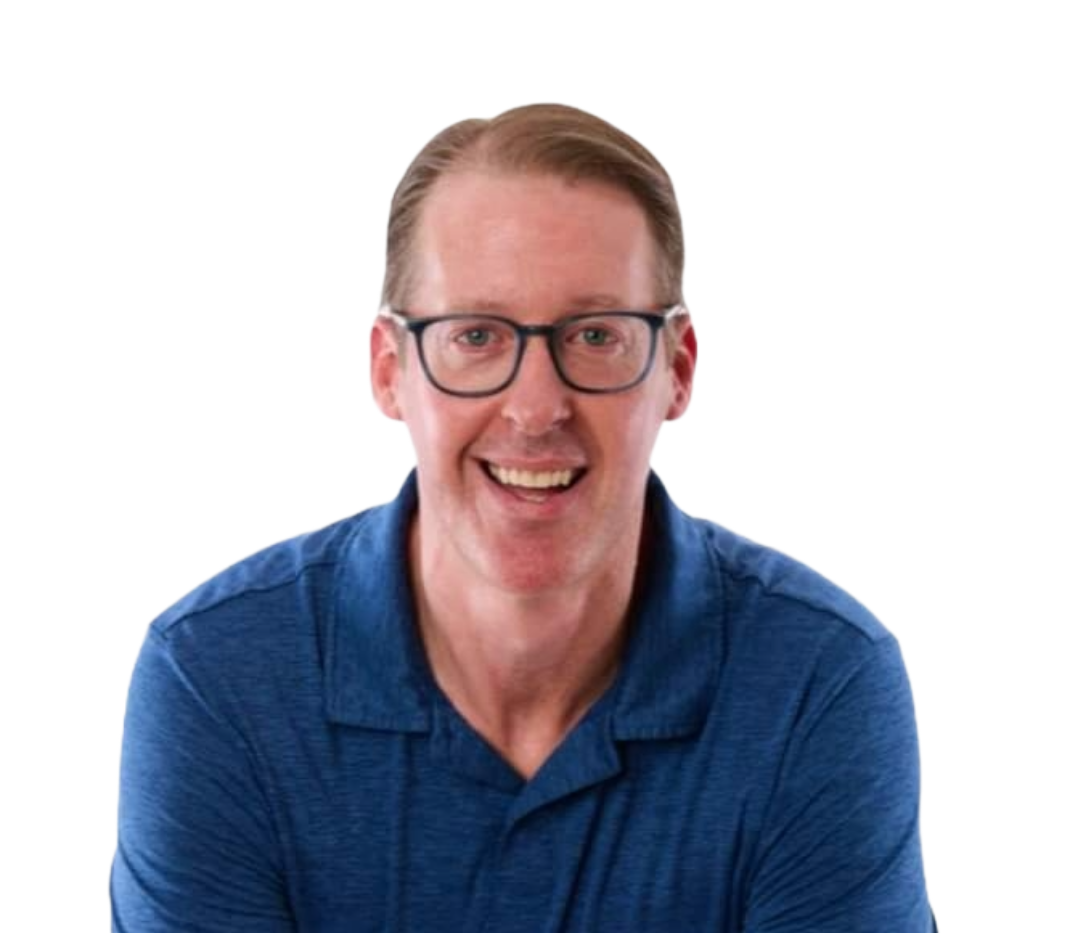 a man wearing glasses and a blue shirt smiles for the camera