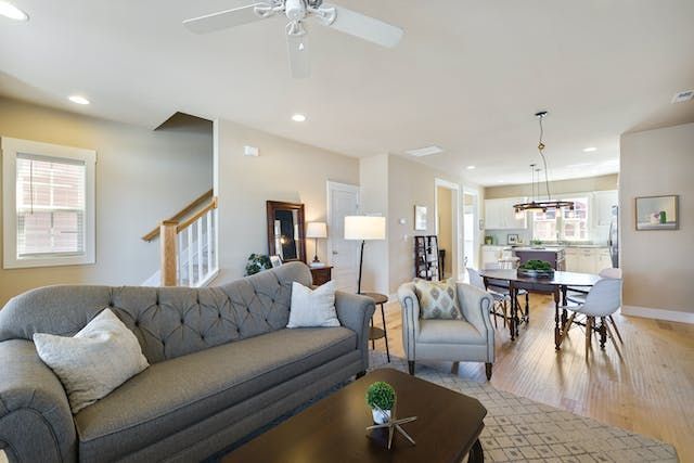 An open concept living room, dining room and kitchen