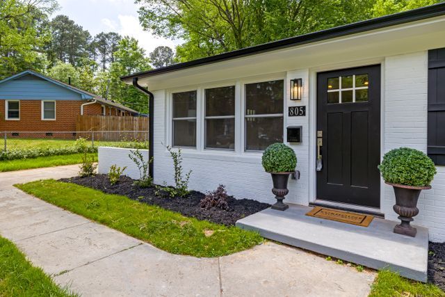 a house with a manicured front lawn