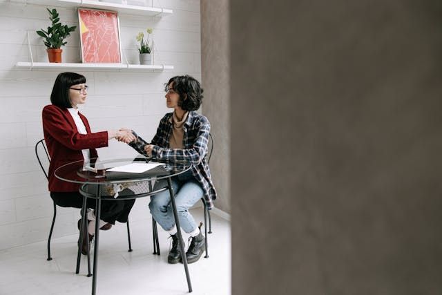 a landlord and tenant shaking hands
