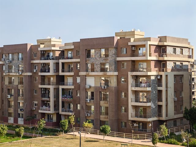 the exterior of a contemporary apartment building