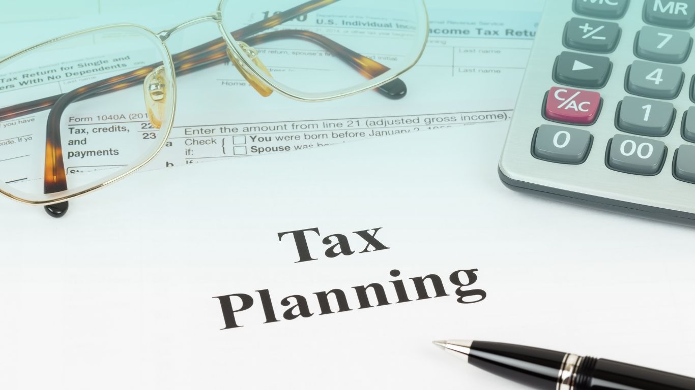 A construction business owner's tax documents, representing tax planning services.