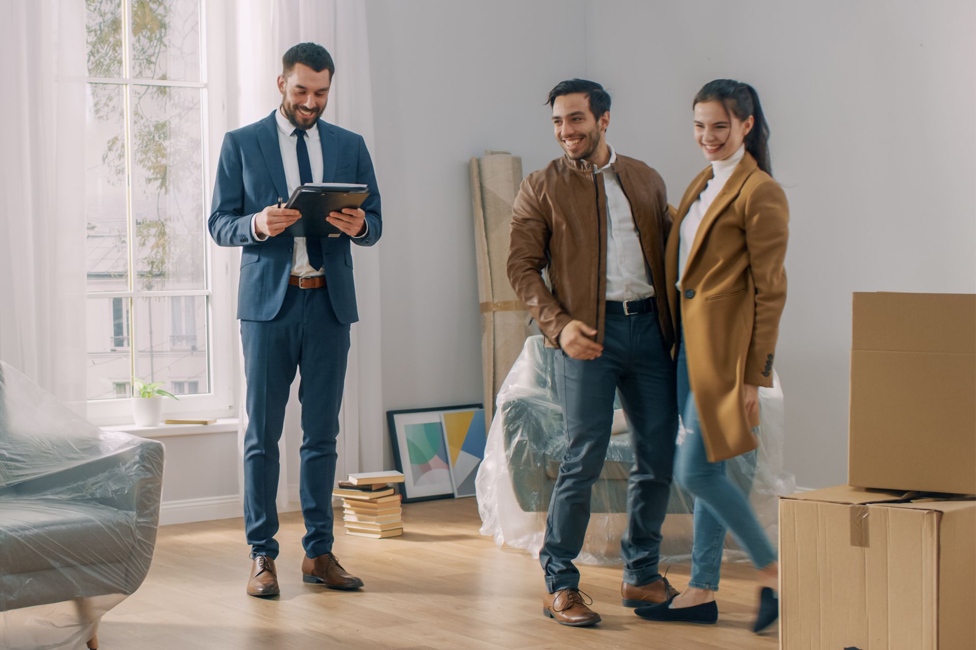 real estate agent with young couple
