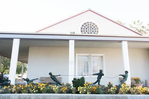 Front window with statues at Emmerson-Bartlett Memorial Chapel Redlands, CA