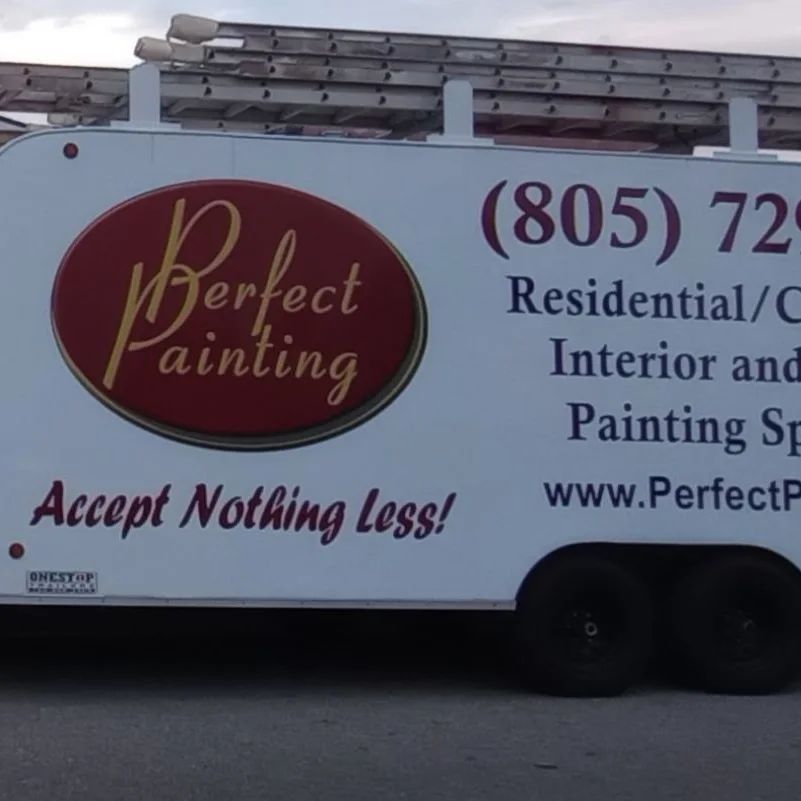 White trailer with “Perfect Painting” logo, phone number, and painting service text.