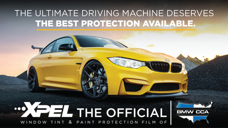 Yellow BMW M3 on a road at sunset with XPEL and BMW CCA branding, promoting paint protection.