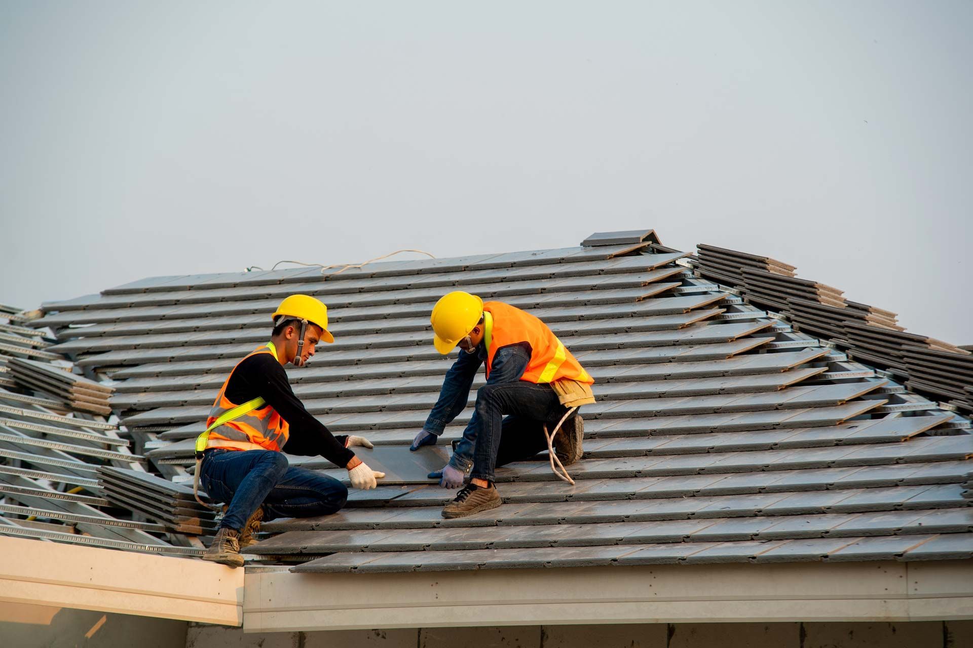 Roofer worker Installing new roof.