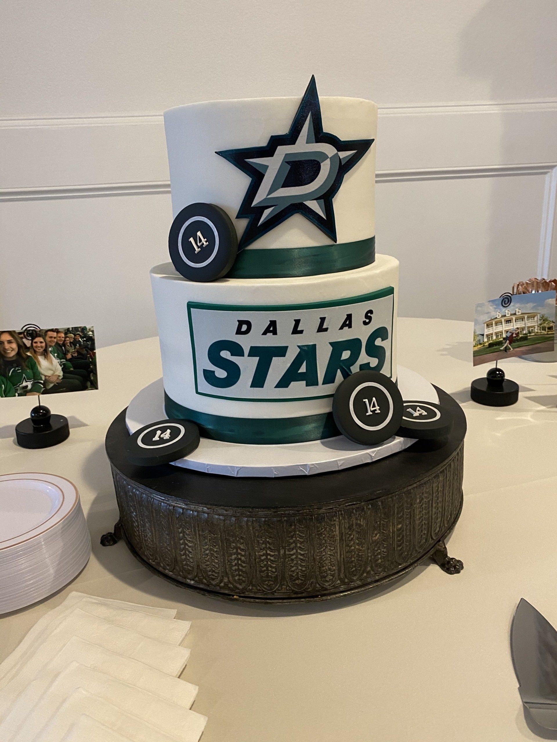 A cake with the dallas stars logo on it