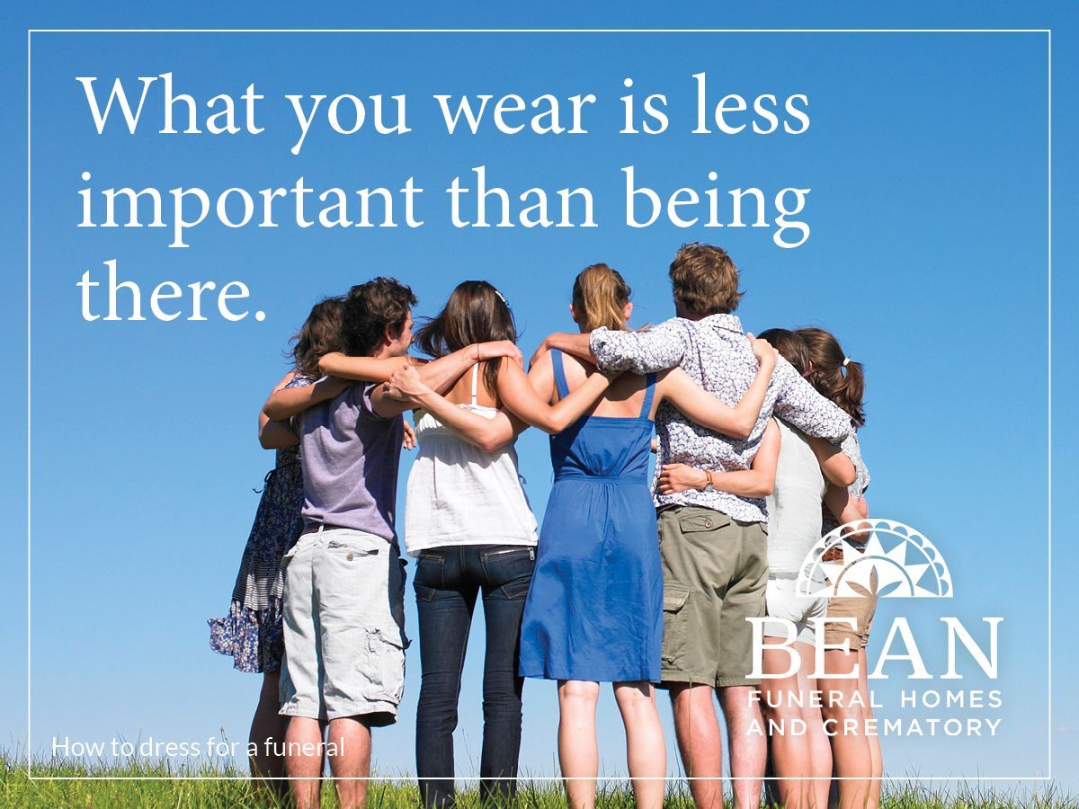 Group of people embracing at a funeral, Bean Funeral Homes blog image