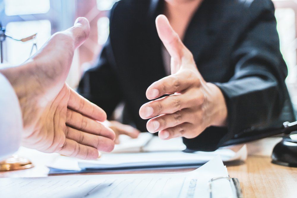 Close Up Shaking Hands in the Office — Planning Lodgement Services in Scone, NSW