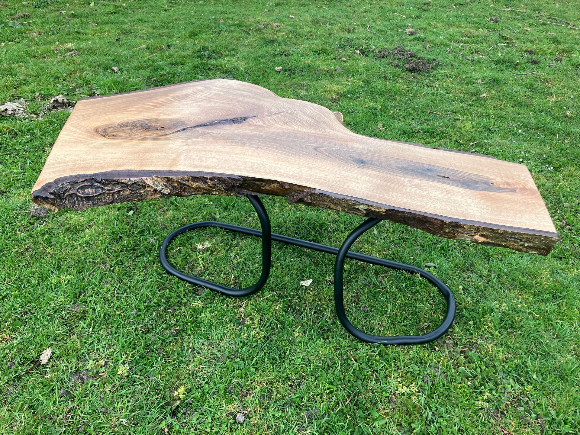 Walnut coffee table with metal legs