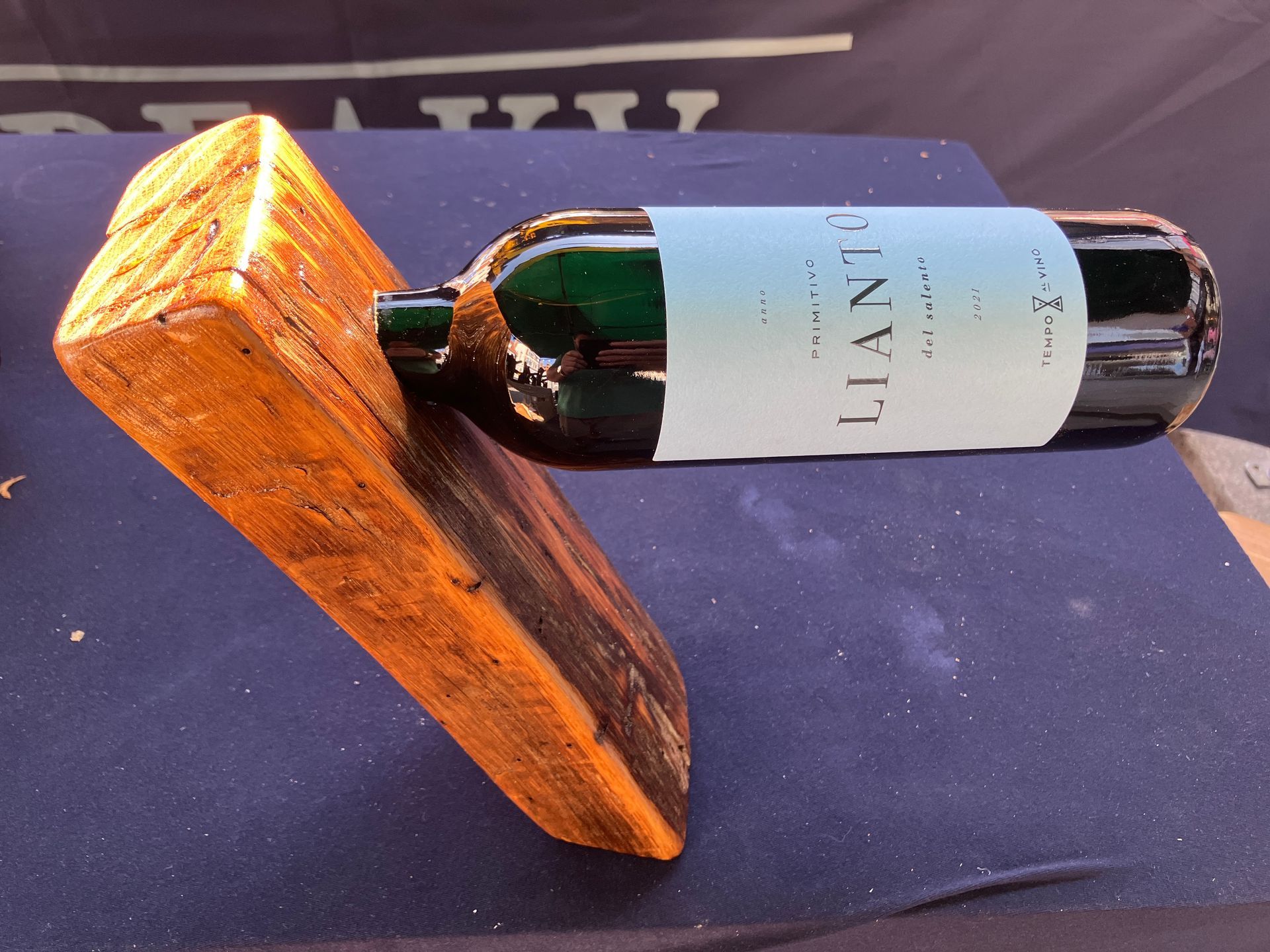 Floating wine bottle holder