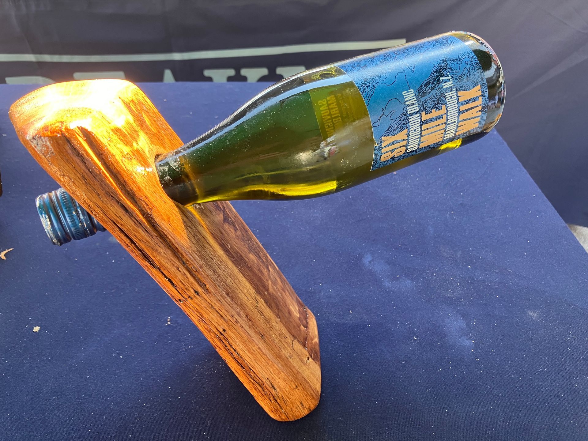 Floating wine bottle holder