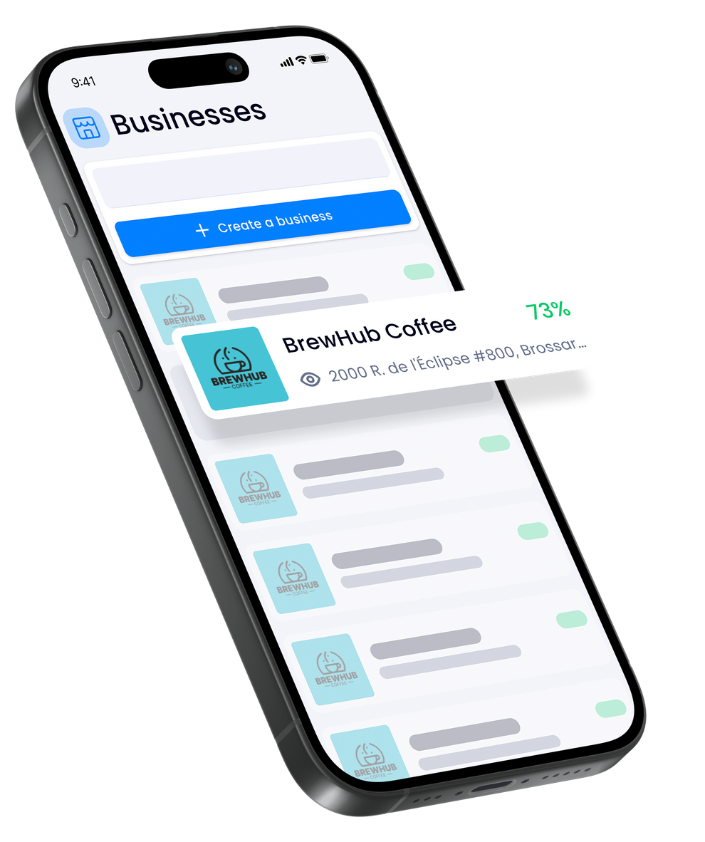 A cell phone is displaying a list of businesses on its screen.