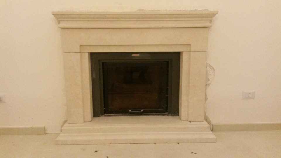 cream-colored natural stone fireplace