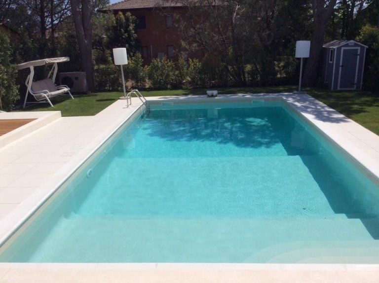 garden with natural stone cladding and swimming pool