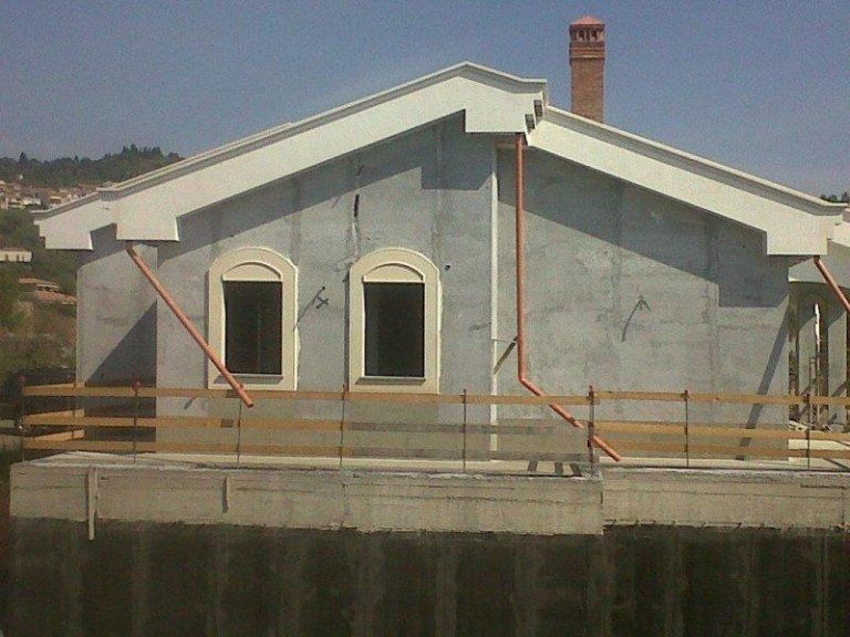 palace with windows with white stone jambs