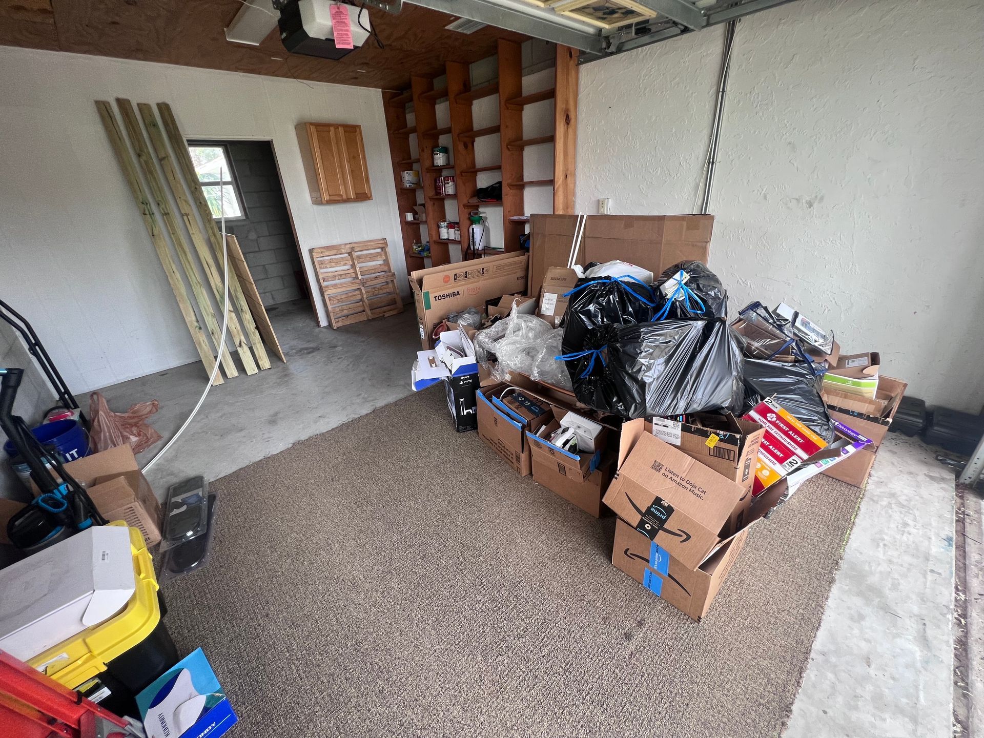 Garage boxes and carboard before