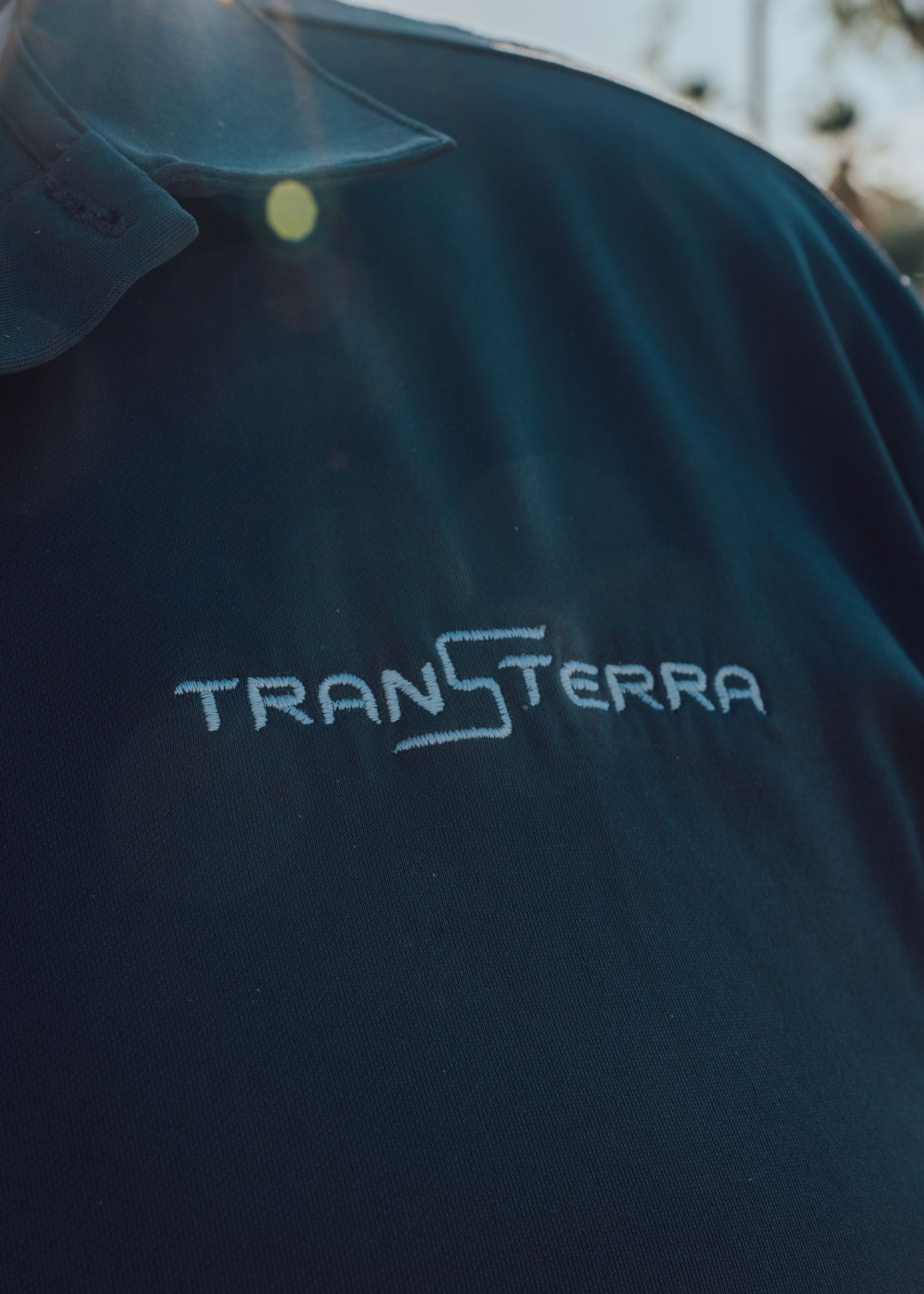 Professional TransTerra driver uniform for private group transportation services