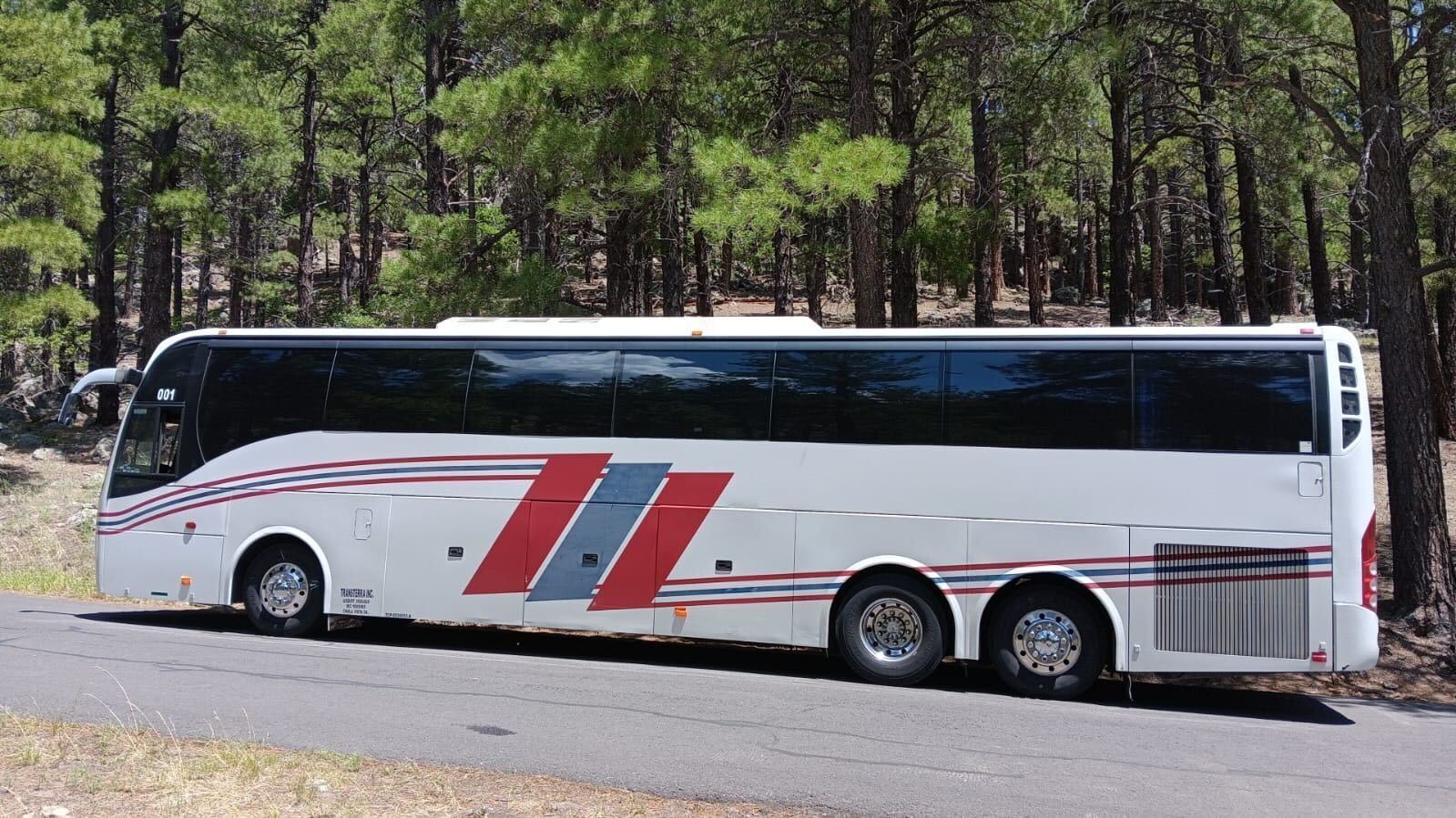 Bus driving along coastal San Diego roads