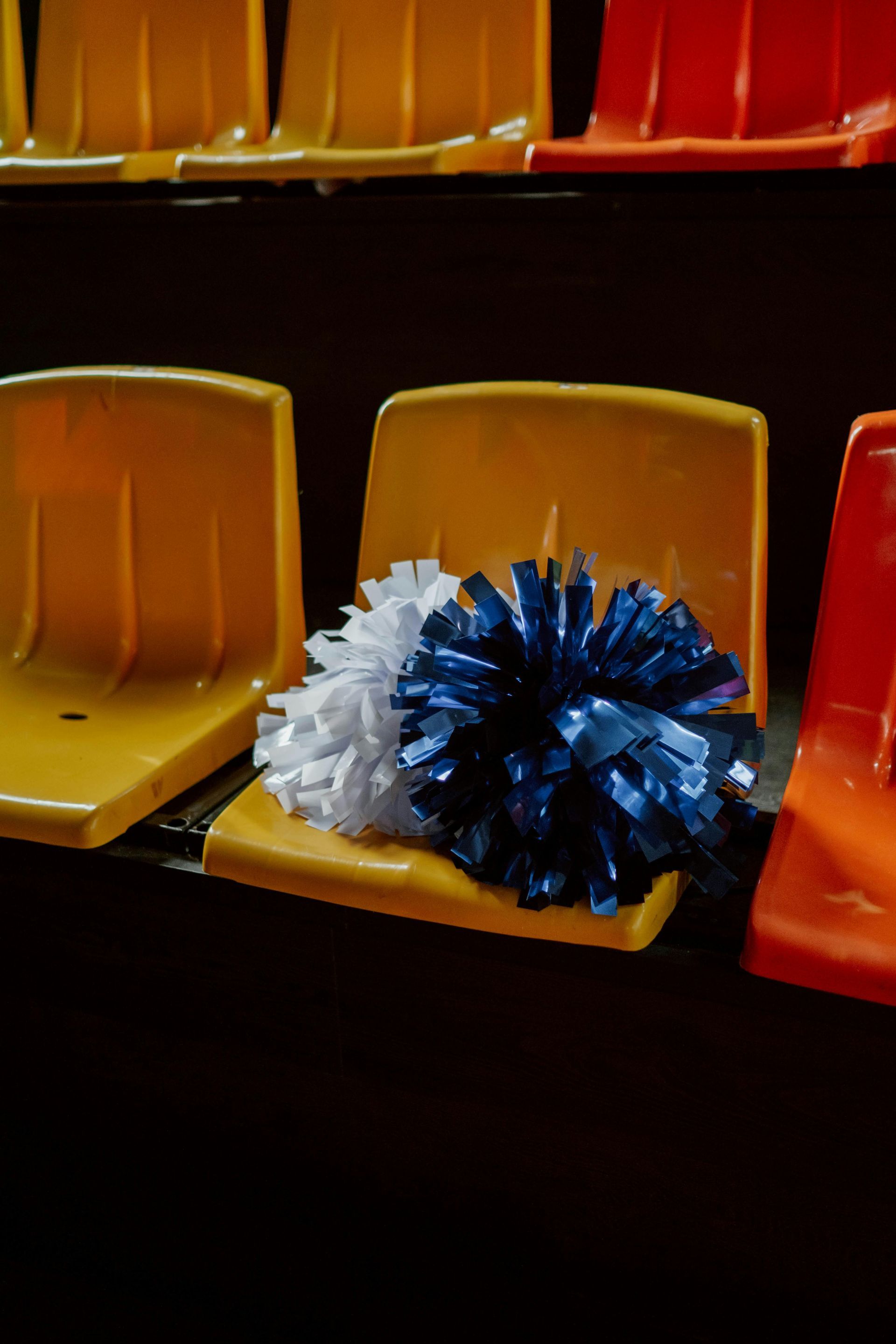 Cheerleader pom poms at local sporting event in San Diego