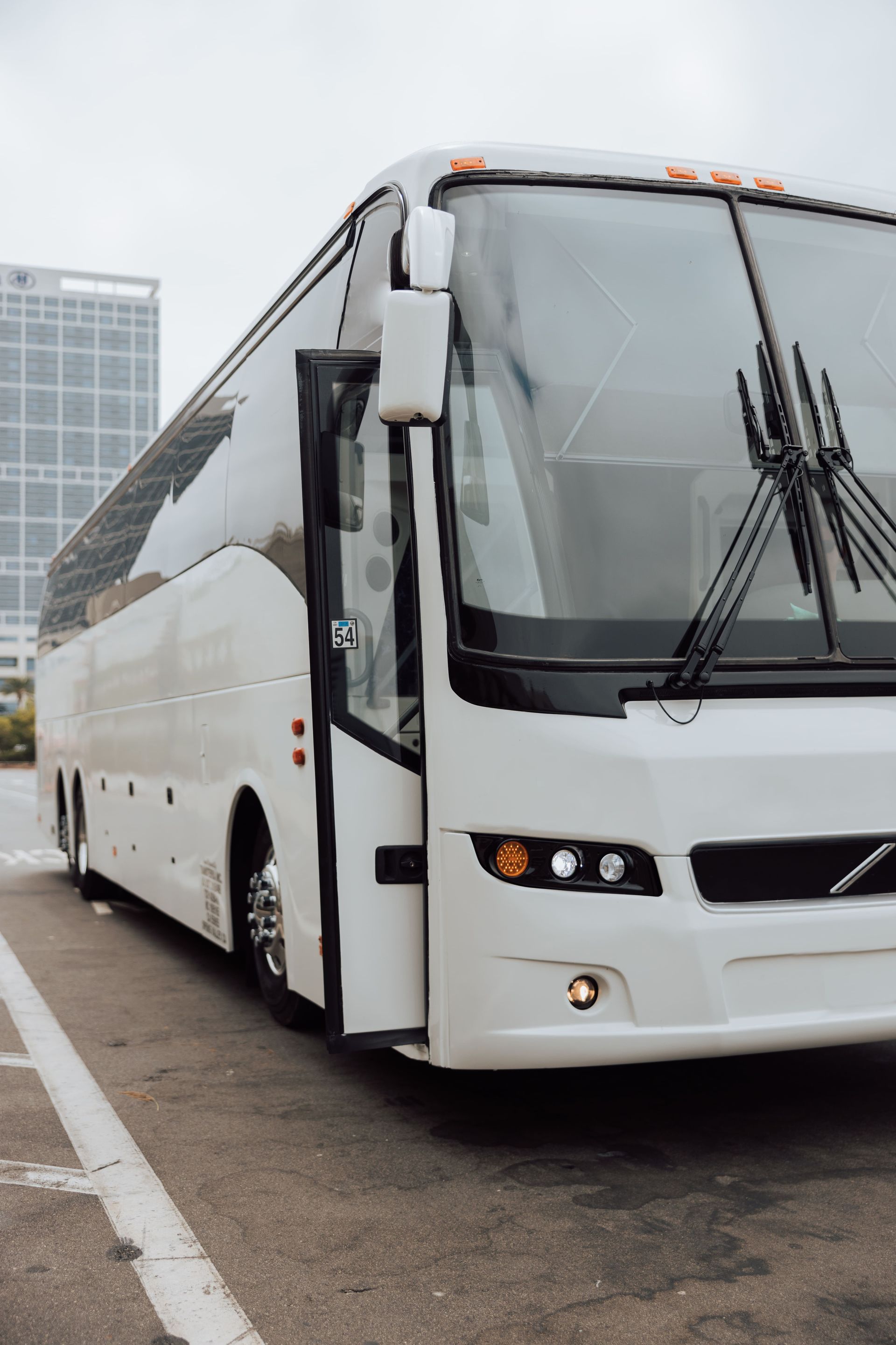 Side view of modern charter bus providing group transportation services in Riverside County
