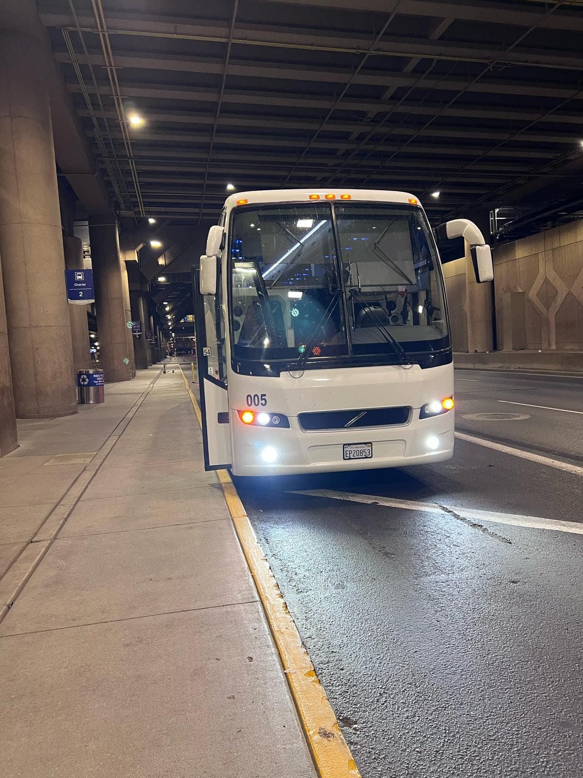 Charter bus dropping off a company holiday party group in San Diego