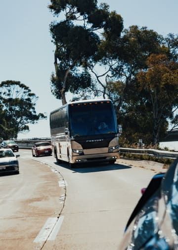 Group traveling together on a charter bus for reliable transportation in San Diego