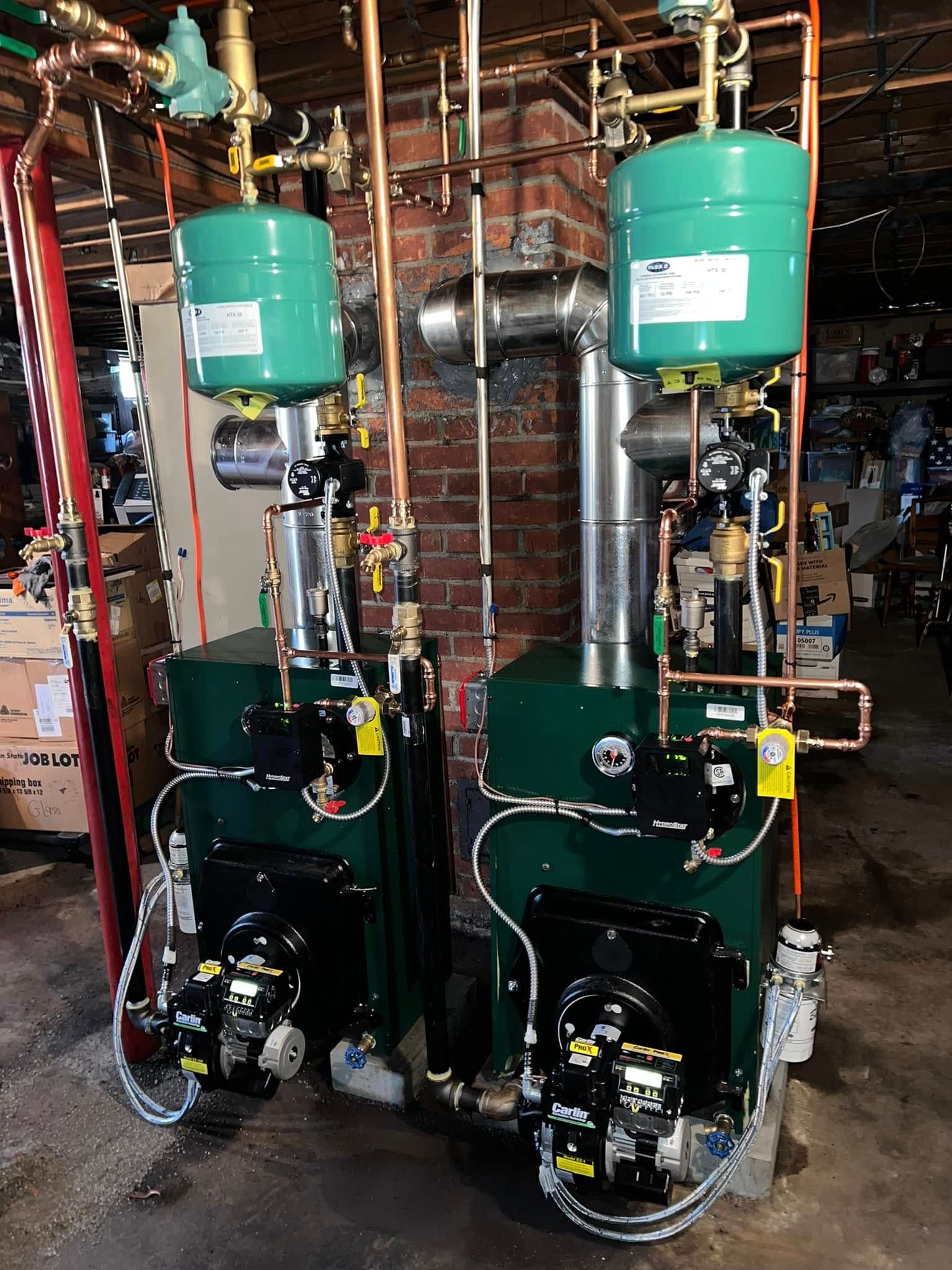 A pile of copper and silver rings on a black surface