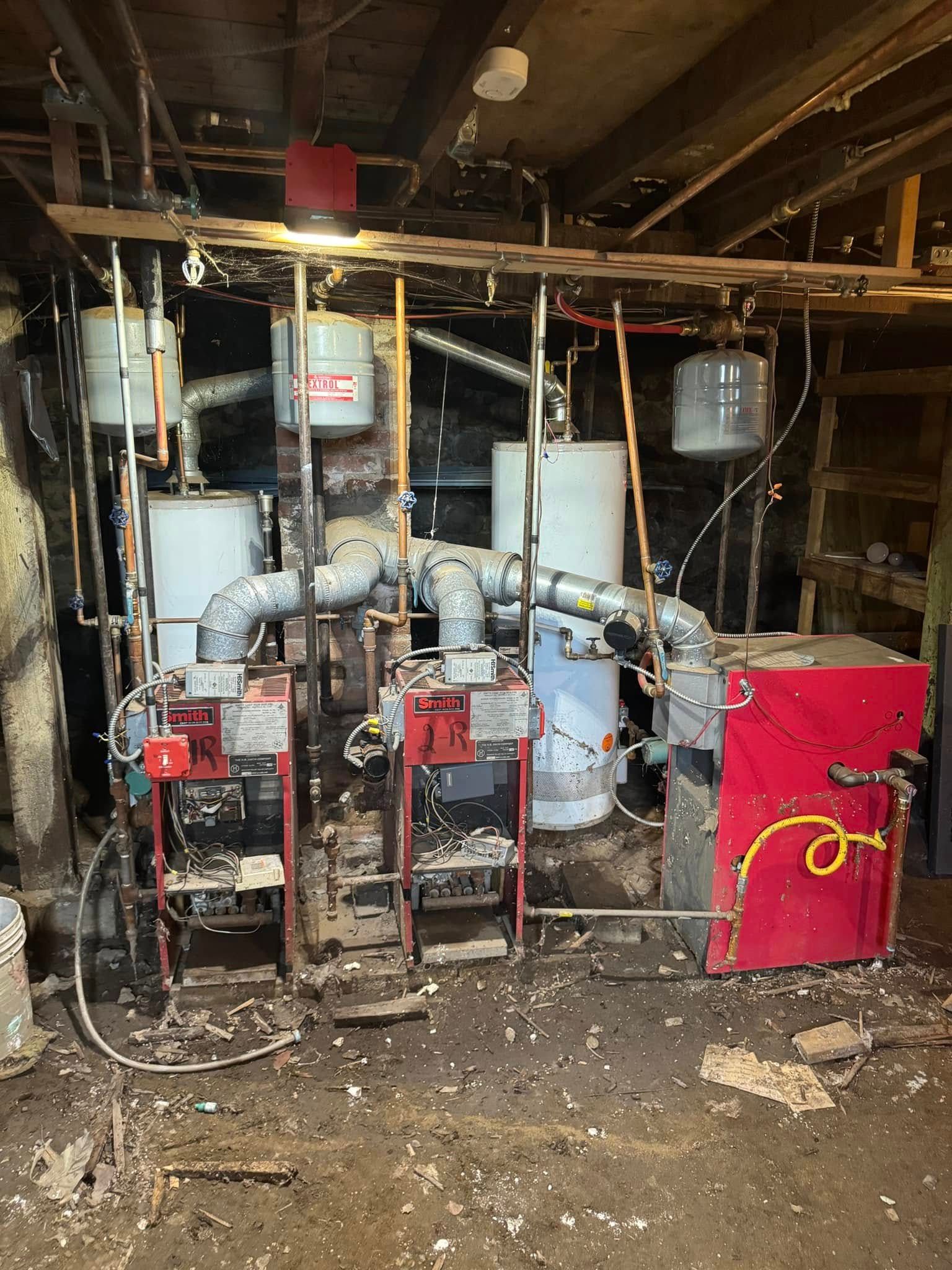 A pile of metal keys on a blue surface