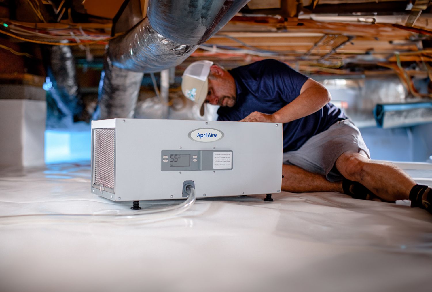 A pile of copper and silver rings on a black surface
