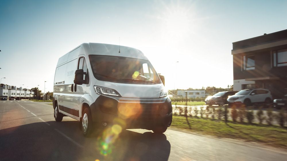 A White Van is Driving Down a Highway — Express Couriers Mackay in West Mackay, QLD