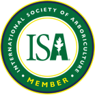 International Society of Arboriculture member logo with green and gold circular seal and ISA letters