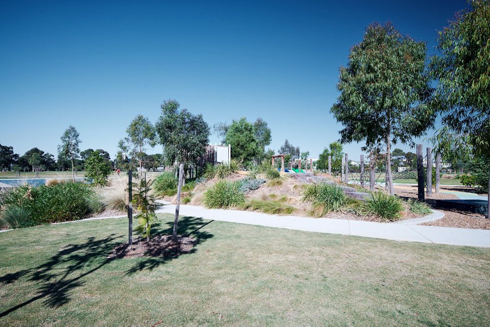 A Landscaped Park With a Winding Concrete Path — Quarrell Civil Construction In Congupna, VIC