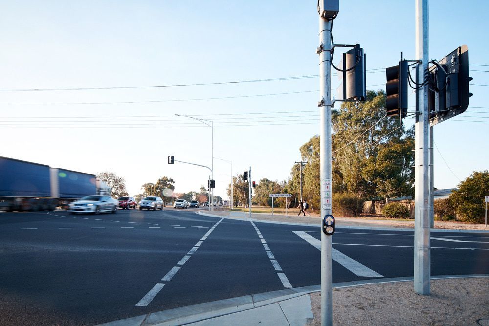 A Traffic Light Pole Stands at an Intersection — Quarrell Civil Construction In Congupna, VIC