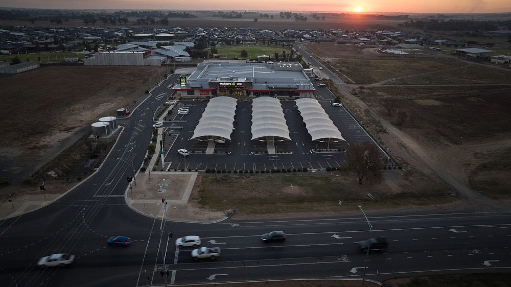An Aerial View at Sunset of a Commercial Retail Center — Quarrell Civil Construction In Congupna, VIC