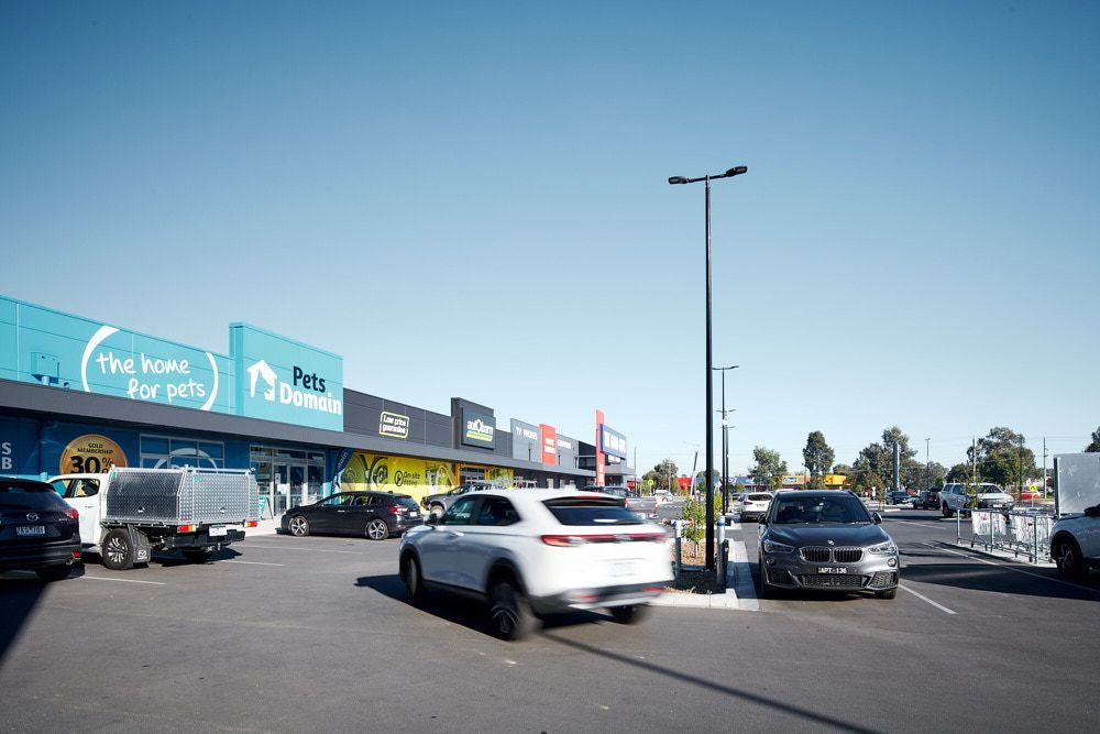 A Line of Retail Stores in a Shopping Center Parking Lot — Quarrell Civil Construction In Congupna, VIC