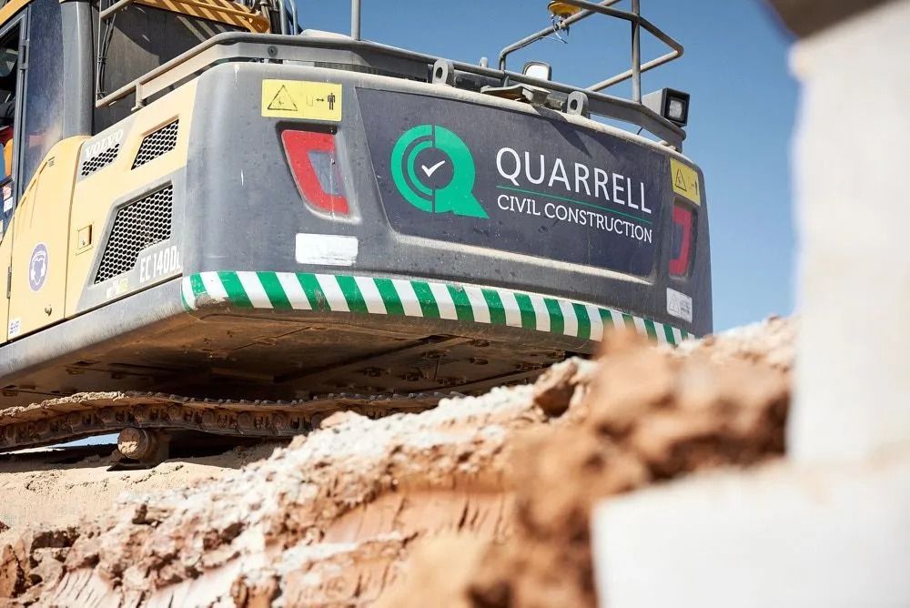 A Yellow and Dark Grey Quarrell Civil Construction Excavator — Quarrell Civil Construction In Congupna, VIC