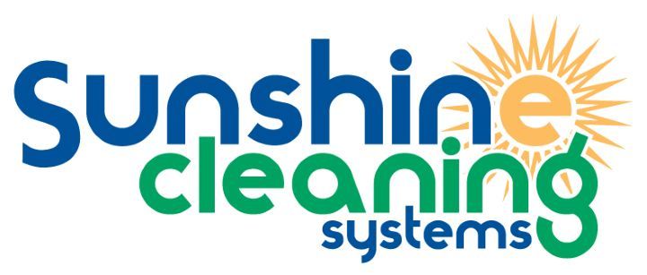 Sunshine Cleaning Systems logo: Blue and green text with a sun graphic.