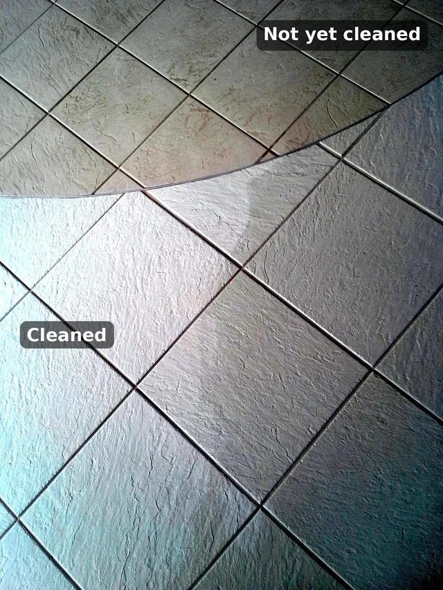 Ceramic tile floor in a Waltham retail store, half cleaned by Sunshine Cleaning Systems, showing clean tile next to soiled tile
