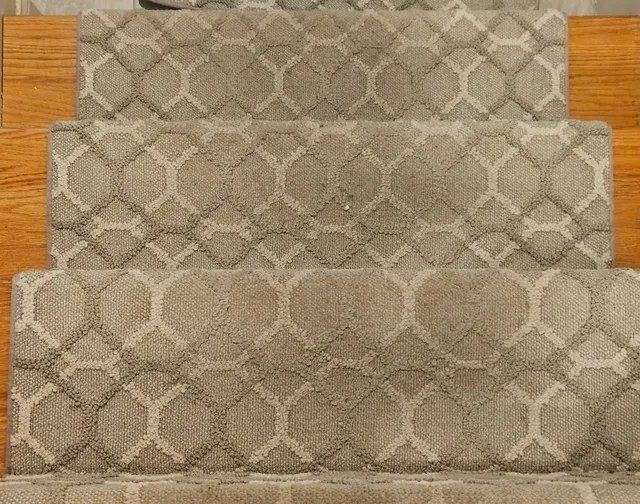 Patterned stair runner in a Wellesley home, dulled by foot traffic before cleaning.