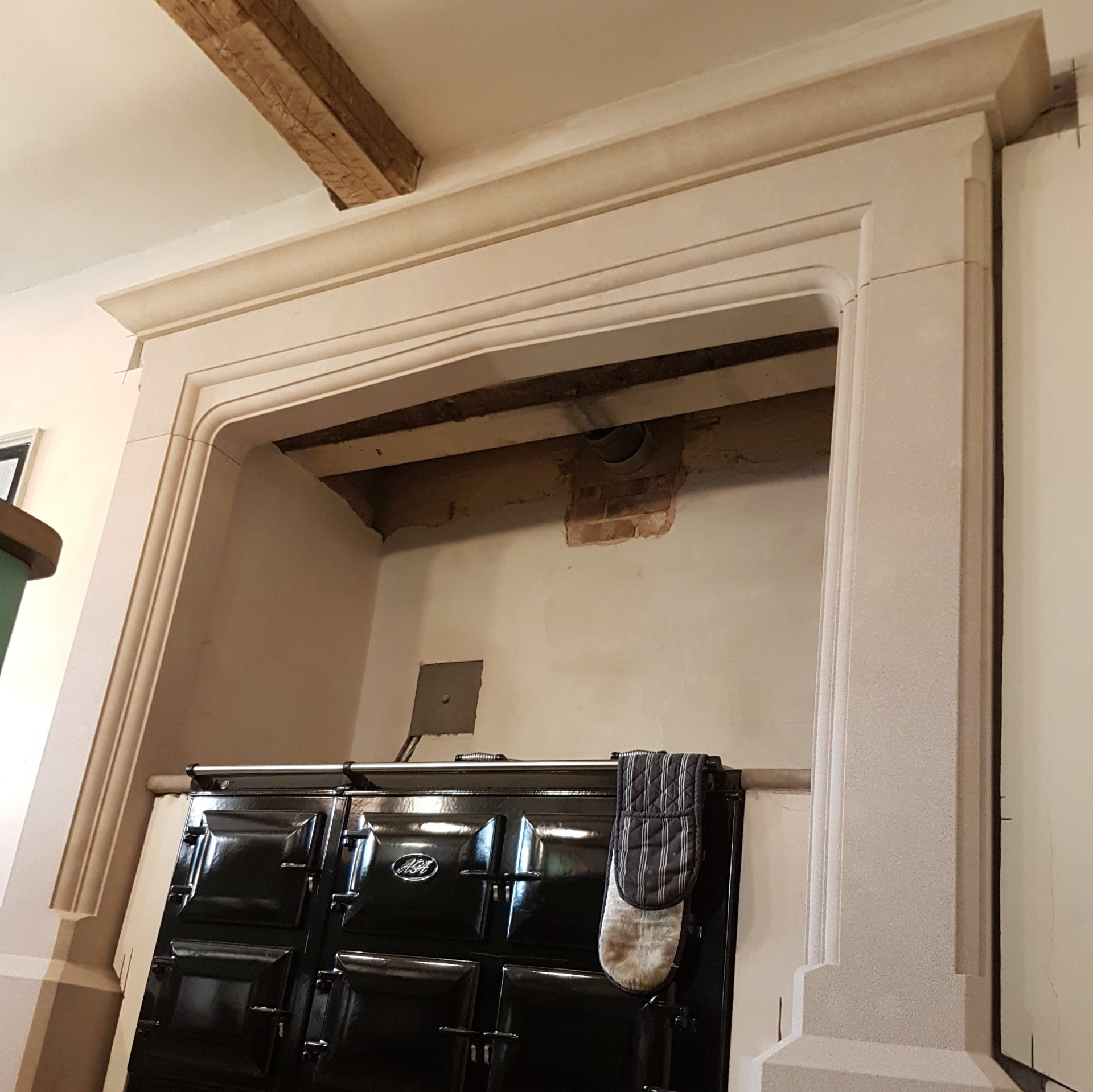 Large carved fireplace to surround aga
