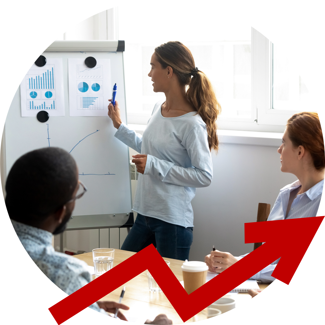 A woman is giving a presentation to a group of people