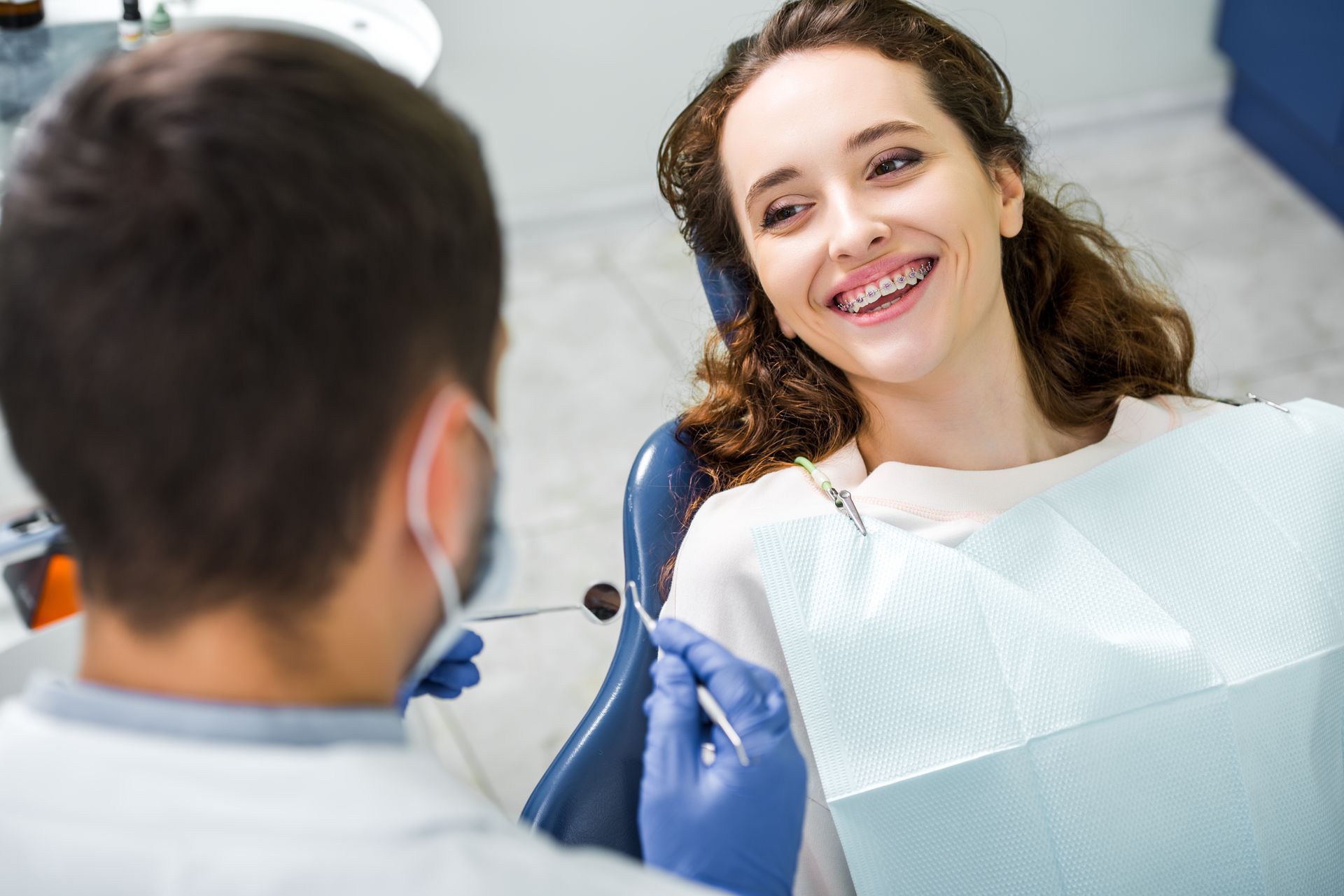 Patient with braces at dentist