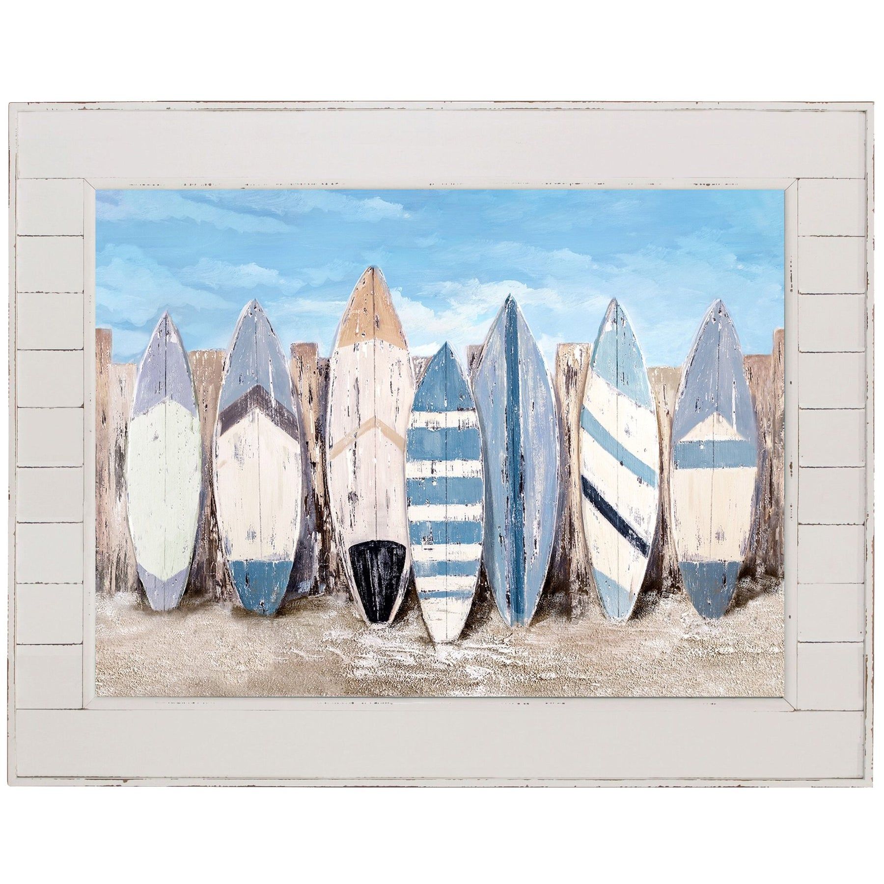 Seven weathered surfboards leaned against a wooden fence on a beach under a blue sky.